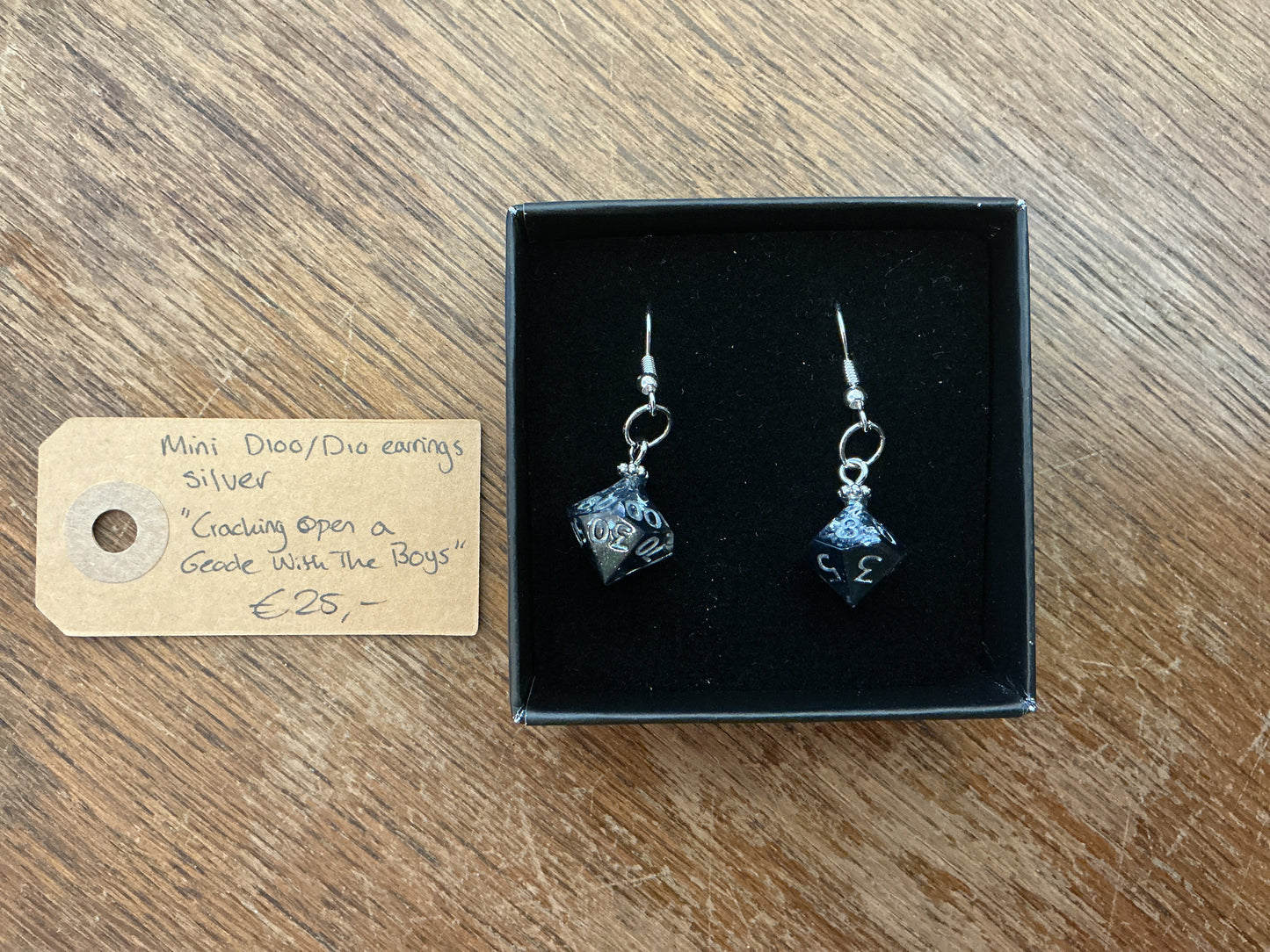 Mini D100/D10 silver earrings “Cracking open a geode with the boys”