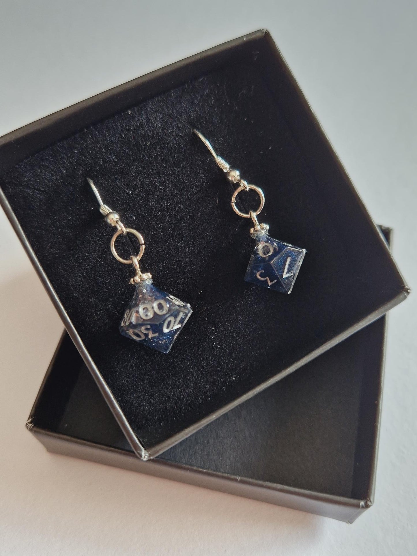 Mini D100/D10 silver earrings “Cracking open a geode with the boys”