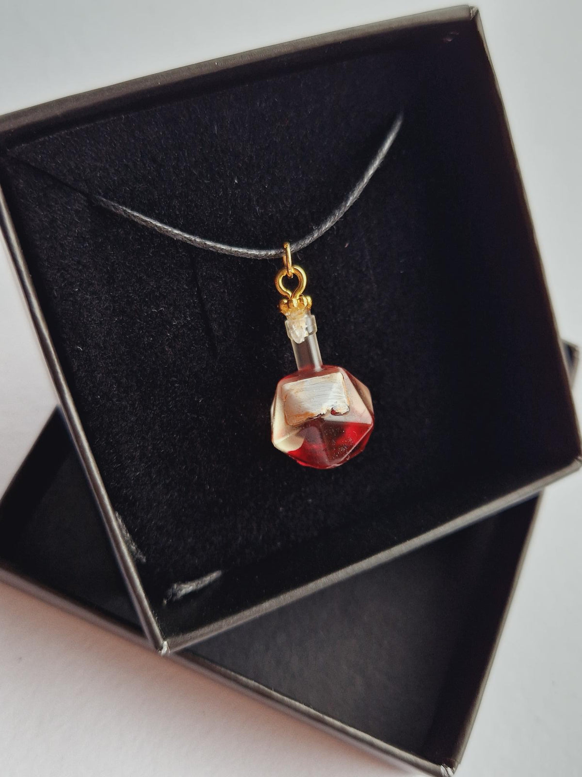 Potion Pendant necklace “Charmed, I’m sure”