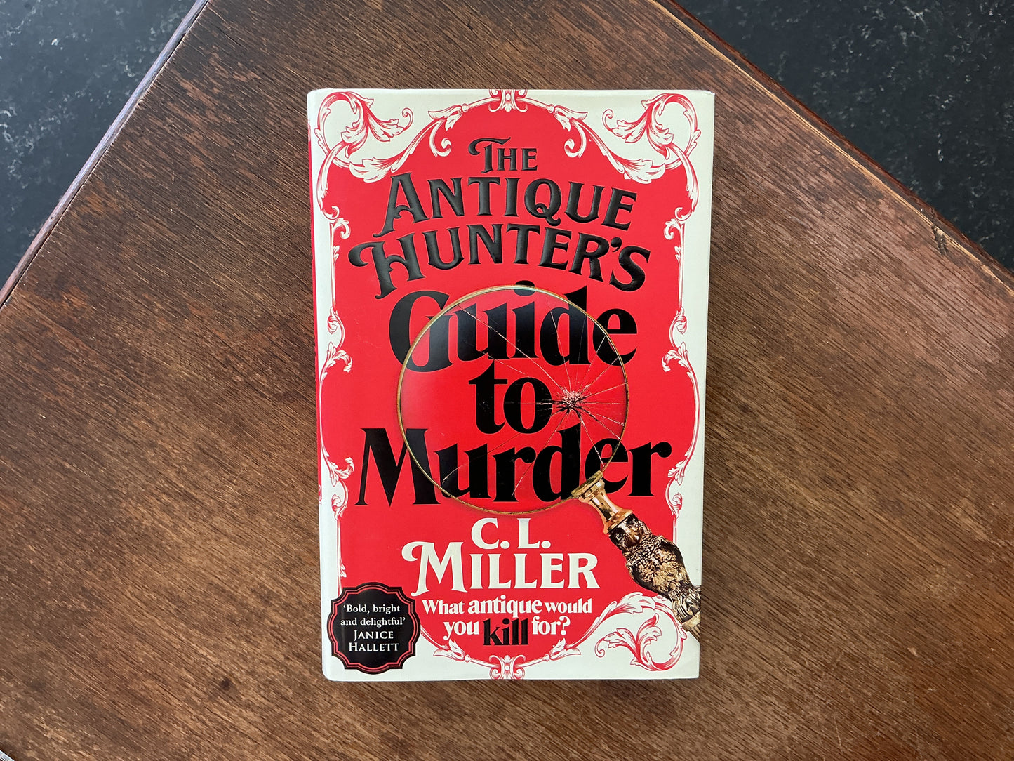 The Antique Hunters Guide to Murder by C. L. Miller