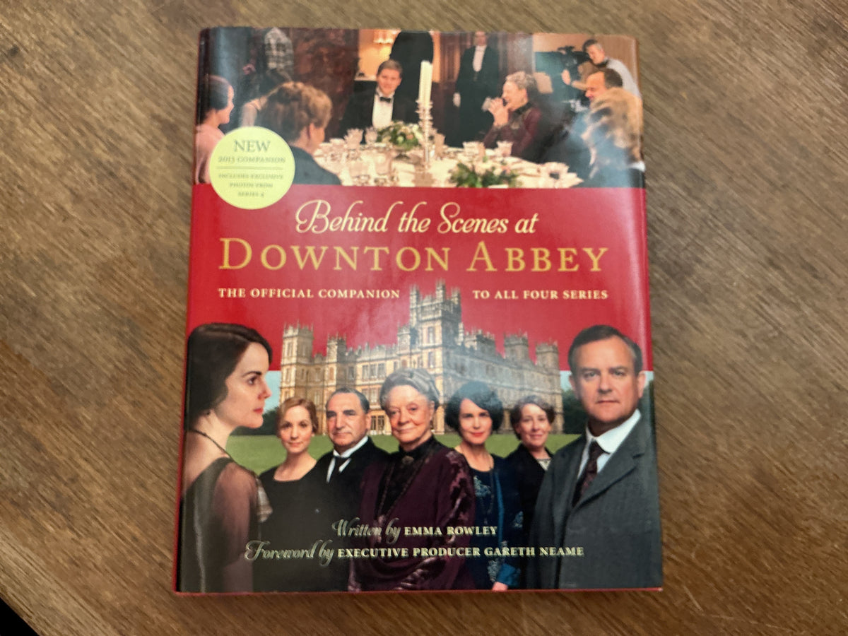 Behind the scenes at Downton Abbey , The official companion to all four series by Emily Rowley